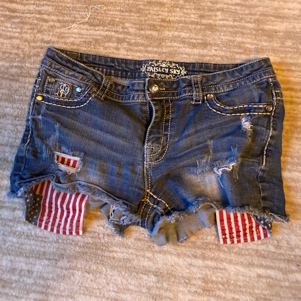 Paisley Sky Dark Blue Distressed Denim Cutoff Shorts with Flag Patch